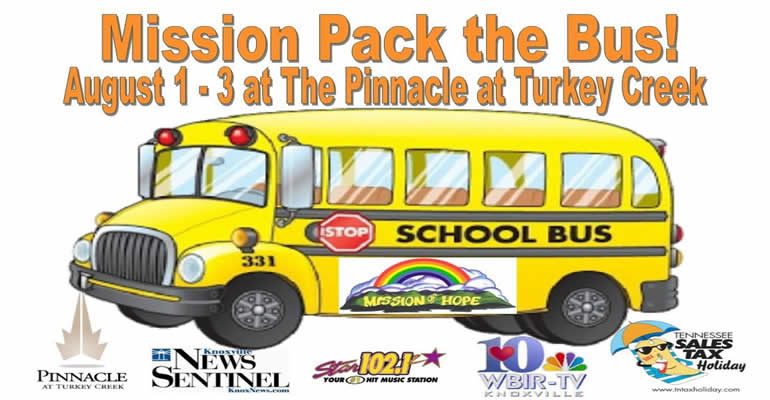 A school bus with the words mission pack the bus.
