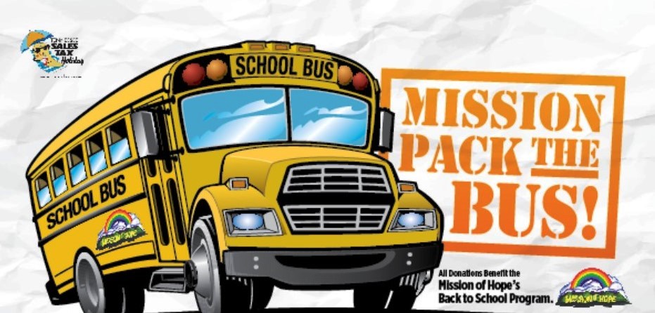A school bus with the words mission pack the bus.